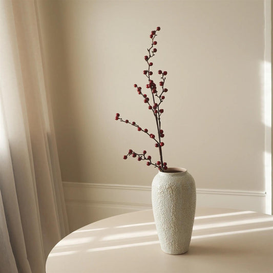 Dark red Winterberry branch