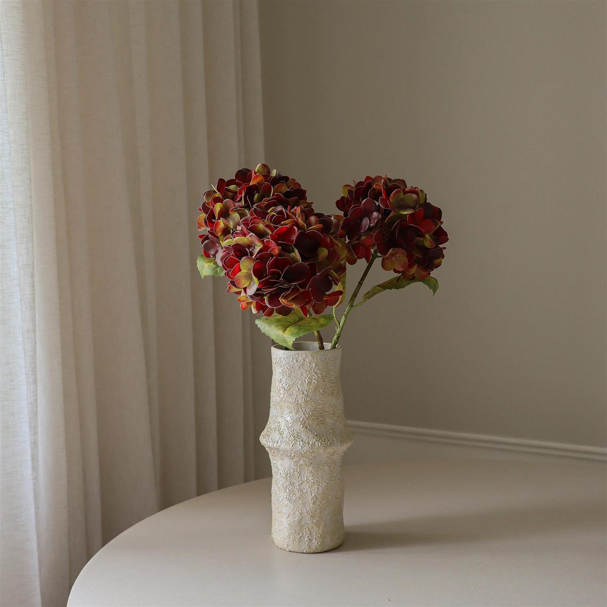 Deep burgundy hydrangea flower