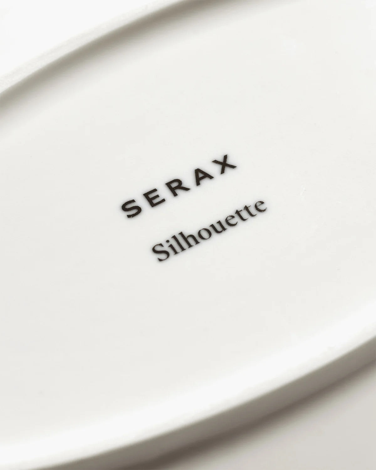 Fat oval L white silhouette