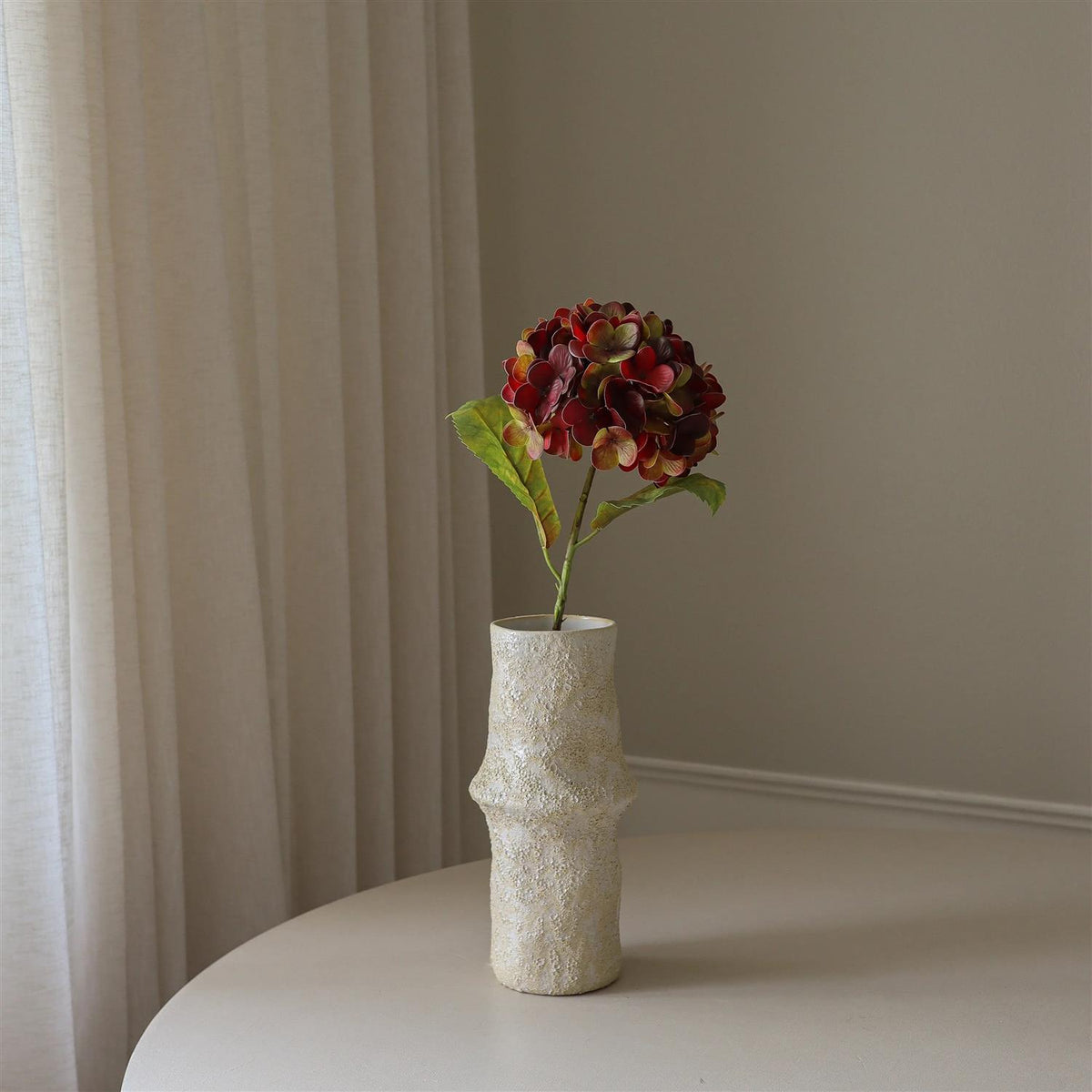 Deep burgundy hydrangea flower