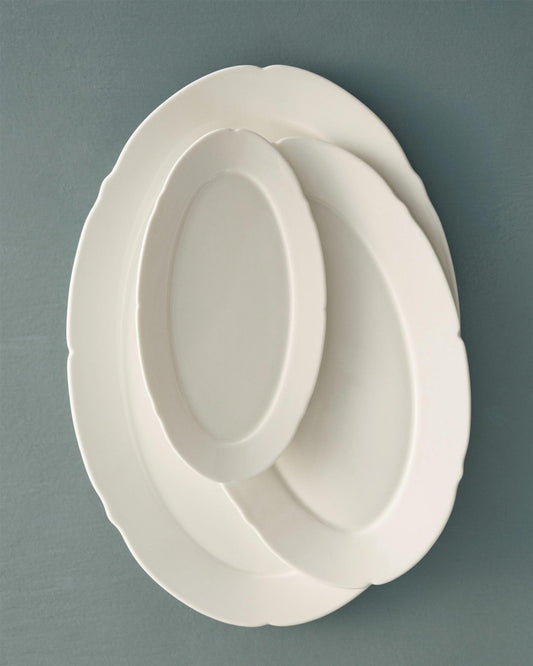 Fat oval L white silhouette